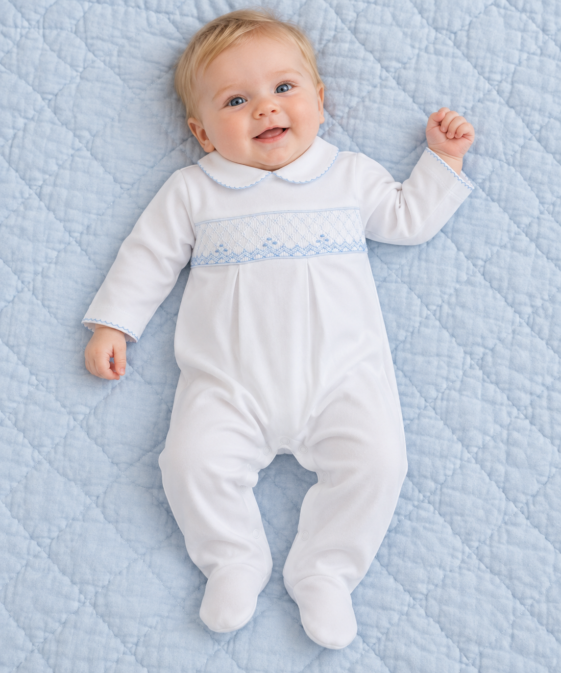 White baby boys smocked footie