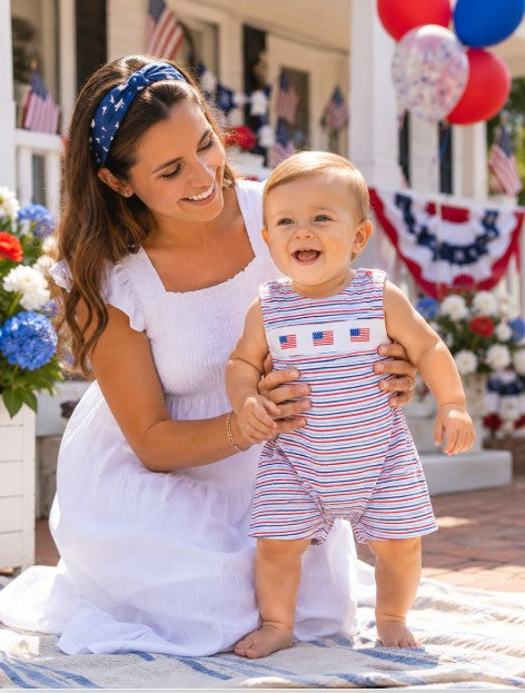 Red white and blue striped boy's overall